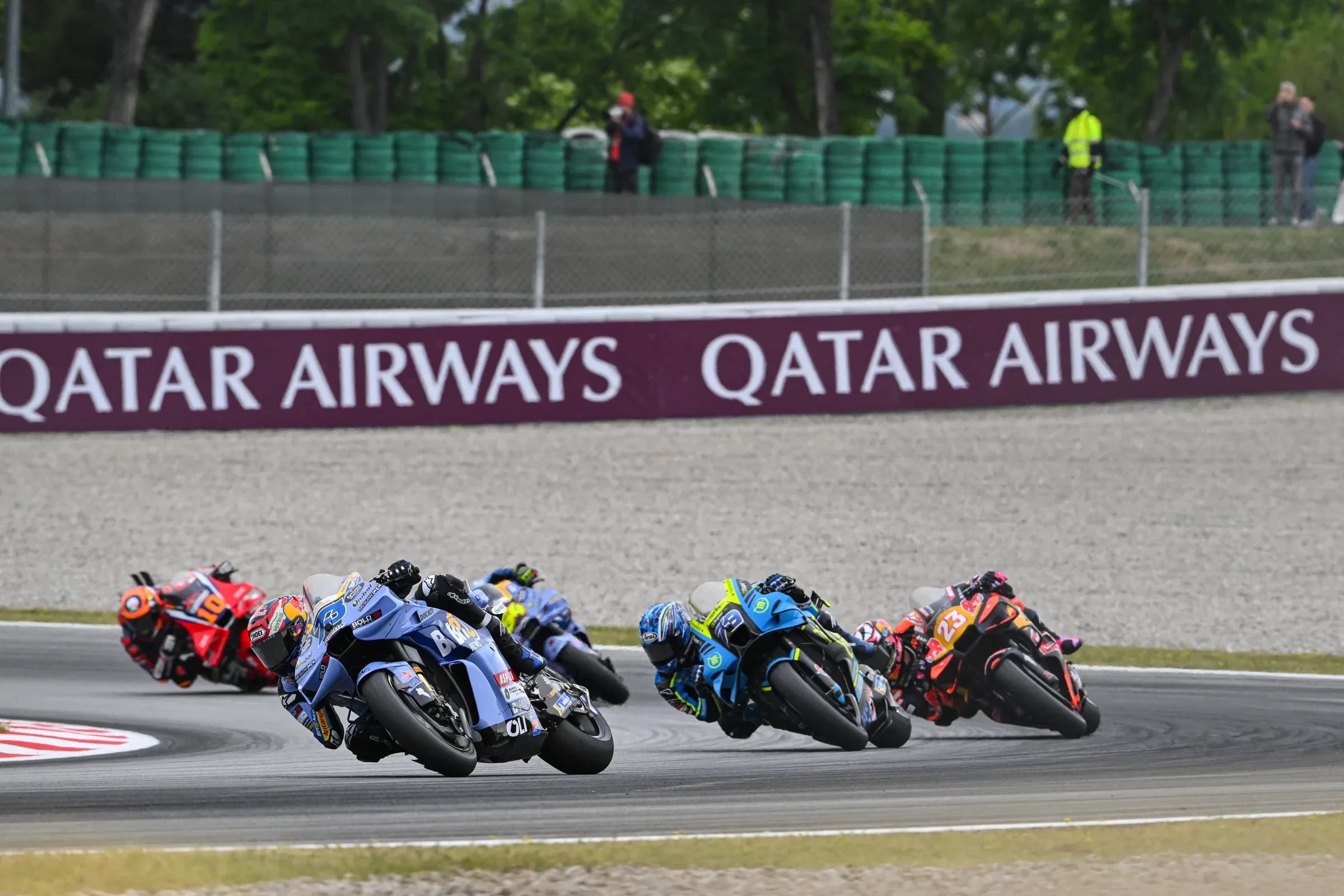 MotoGP riders through a corner