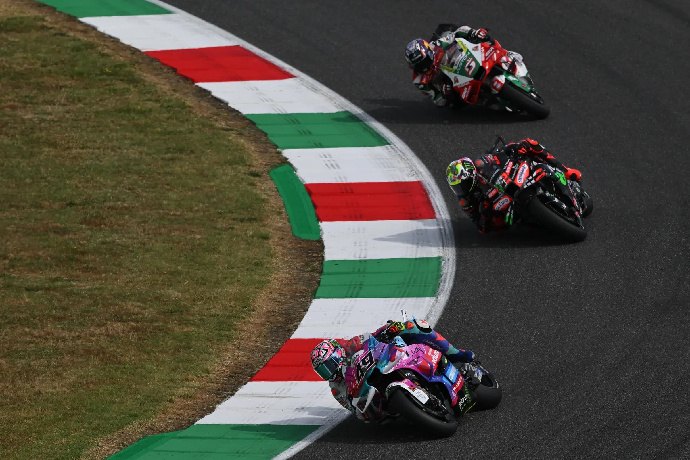 MotoGP riders through a corner