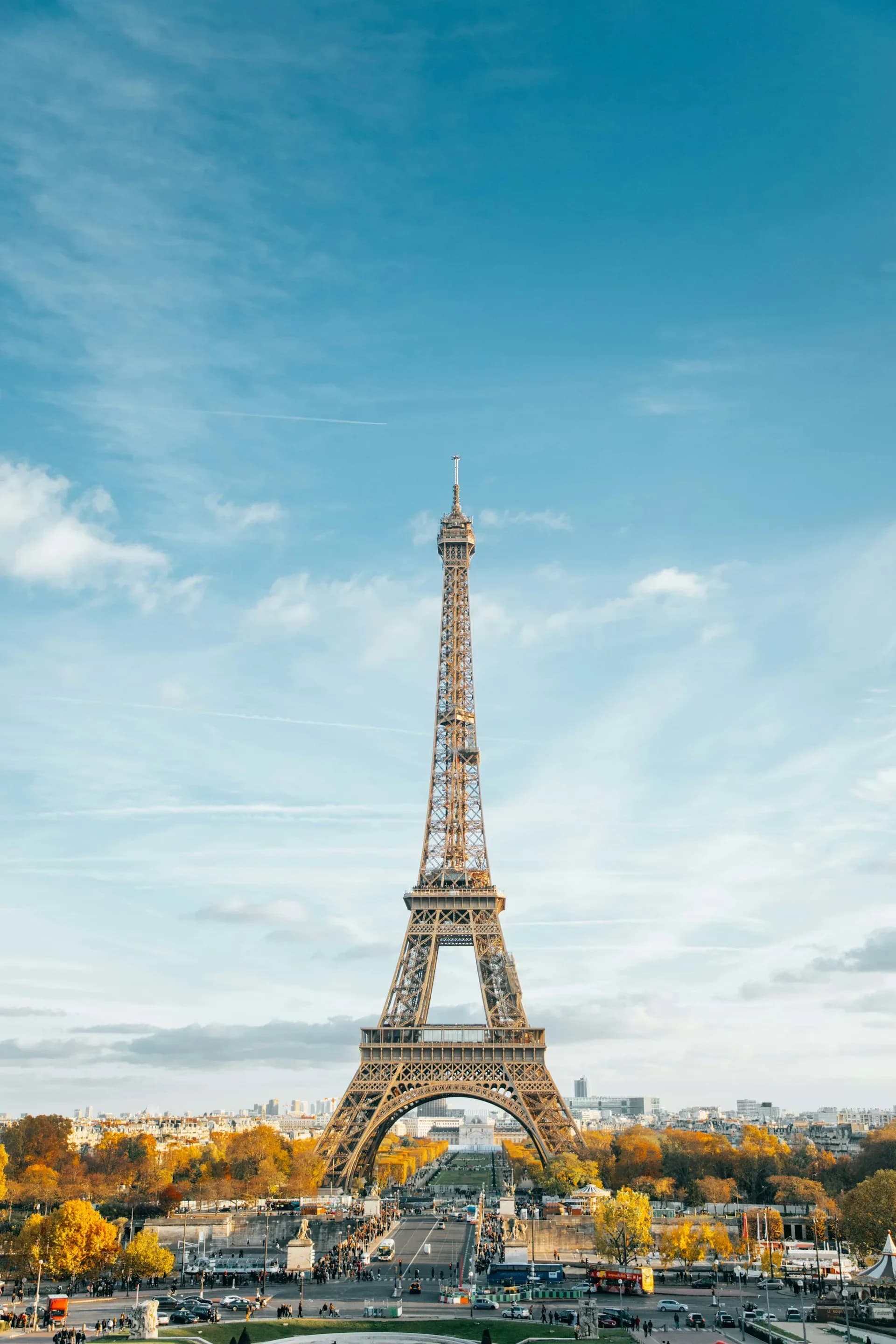 The Eiffel Tower above the city in autumn light